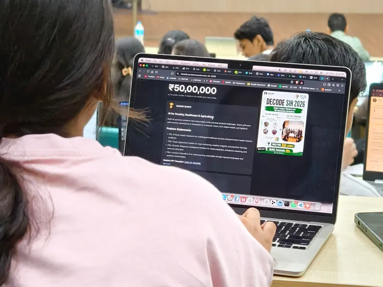 Participant reading an innovation hackathon challenge brief
